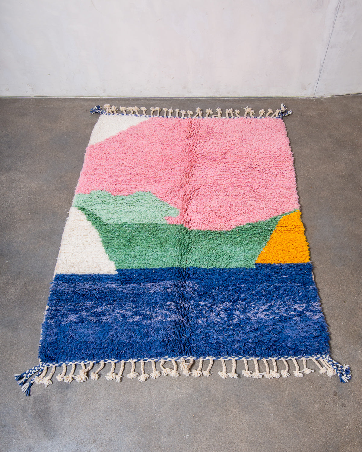 Modern, designer, handcrafted Berber rug from Morocco. Beniourain carpet with beautiful colours and patterns and fluffy wool texture.